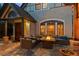 Inviting back patio with a stone floor, comfortable seating, and a cozy fire pit at 848 S Emerson St, Denver, CO 80209