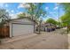 Spacious two-car detached garage with a clean white door and ample parking space at 848 S Emerson St, Denver, CO 80209