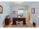 Bright office with wooden desk, rug and light blue paint at 848 S Emerson St, Denver, CO 80209