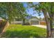 Front exterior of a charming two-story home with a driveway and landscaping at 16623 E Asbury Pl, Aurora, CO 80013