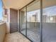 Spacious balcony with city views reflected in the sliding glass door at 1020 15Th St # 24H, Denver, CO 80202