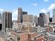 Stunning city view showcases the skyline with high-rise buildings and blue sky at 1020 15Th St # 24H, Denver, CO 80202