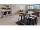 Comfortable dining area with desk and city views in the background at 1020 15Th St # 24H, Denver, CO 80202