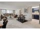 Spacious open-concept living area with dining and kitchen access at 1020 15Th St # 24H, Denver, CO 80202