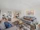 Open concept living room with a desk, dining area and comfortable seating at 1020 15Th St # 24H, Denver, CO 80202