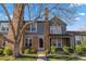 Charming two-story home with brick accents and well-maintained landscaping at 1239 S Flower Cir # C, Lakewood, CO 80232