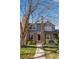 Charming two-story home with brick accents and well-maintained landscaping at 1239 S Flower Cir # C, Lakewood, CO 80232