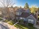 Charming two-story home features a well-manicured lawn, lovely landscaping, and inviting curb appeal at 1239 S Flower Cir # C, Lakewood, CO 80232