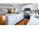 Bright kitchen with stainless steel appliances and a large countertop area at 1239 S Flower Cir # C, Lakewood, CO 80232