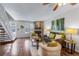 Warm and inviting living room with a fireplace and natural light at 1239 S Flower Cir # C, Lakewood, CO 80232
