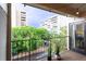 Balcony with planters and outdoor lighting features beautiful views of the neighborhood at 777 N Washington St # 508, Denver, CO 80203