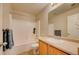 Cozy bathroom featuring a tub-shower combination, and a single sink vanity at 10061 Apollo Bay Way, Highlands Ranch, CO 80130