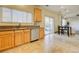 Bright eat-in kitchen with stainless steel appliances and access to outdoor patio at 10061 Apollo Bay Way, Highlands Ranch, CO 80130