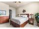 Well-furnished bedroom featuring elegant wooden furniture and ambient lighting at 4473 Echo Dr, Larkspur, CO 80118
