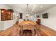 Entertaining game room features a pool table, wet bar, built-in cabinet and wood-style floors at 4473 Echo Dr, Larkspur, CO 80118