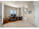 Bright home office featuring a large window, hardwood floors and neutral decor for a comfortable workspace at 4473 Echo Dr, Larkspur, CO 80118