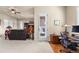 Spacious room combining living and office areas with ample natural light at 4473 Echo Dr, Larkspur, CO 80118