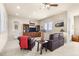 Inviting living room with plush leather chairs and a cozy entertainment center at 4473 Echo Dr, Larkspur, CO 80118