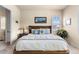Relaxing main bedroom with a ceiling fan, natural light, and comfortable carpet at 4473 Echo Dr, Larkspur, CO 80118