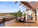 Outdoor patio features gorgeous mountain views, comfortable seating and an outdoor grill at 4473 Echo Dr, Larkspur, CO 80118