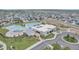 Beautiful aerial view of the community pool and clubhouse, showcasing its amenities and surrounding residential area at 4589 Quandary Peak St, Brighton, CO 80601