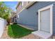 Well-maintained backyard with lush green grass and mature landscaping at 4589 Quandary Peak St, Brighton, CO 80601