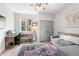 Cozy office space with a desk, sofa, and neutral decor at 4589 Quandary Peak St, Brighton, CO 80601