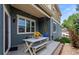 Inviting outdoor patio area with swing, perfect for relaxing and enjoying the fresh air at 4589 Quandary Peak St, Brighton, CO 80601