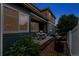 Cozy covered patio with table and chairs, perfect for outdoor dining at 4589 Quandary Peak St, Brighton, CO 80601