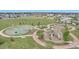 Community playground featuring a basketball court and play area at 4589 Quandary Peak St, Brighton, CO 80601
