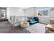 Spacious playroom with a play sofa, ball pit, and carpet at 4589 Quandary Peak St, Brighton, CO 80601