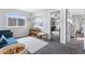 Bright playroom with natural light, play sofa and table at 4589 Quandary Peak St, Brighton, CO 80601