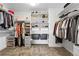Spacious walk-in closet with custom shelving and ample storage for clothes, shoes, and accessories at 4589 Quandary Peak St, Brighton, CO 80601