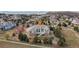 Spacious two-story home featuring stone accents, well-maintained landscaping, and a serene community setting at 6425 Tremolite Dr, Castle Rock, CO 80108