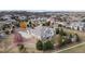 Aerial view of a home's backyard, neighborhood, and landscaping, set in a scenic and peaceful location at 6425 Tremolite Dr, Castle Rock, CO 80108