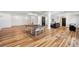 Large finished basement with sleek wood floors, fireplace and an entertainment area at 6425 Tremolite Dr, Castle Rock, CO 80108