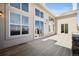 Spacious deck with a stone accent wall, offering an excellent outdoor living and entertaining space at 6425 Tremolite Dr, Castle Rock, CO 80108