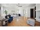 Spacious bedroom featuring hardwood floors and an ensuite bathroom entrance at 6425 Tremolite Dr, Castle Rock, CO 80108