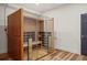 Modern sauna with wooden interior, glass doors, and bench seating for relaxation at 6425 Tremolite Dr, Castle Rock, CO 80108