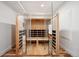 Modern sauna room equipped with wooden benches, creating a serene wellness experience at 6425 Tremolite Dr, Castle Rock, CO 80108