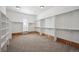 Spacious walk-in closet featuring custom shelving and ample storage space at 6425 Tremolite Dr, Castle Rock, CO 80108