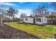 A well-maintained backyard with lush lawn and ample space for outdoor enjoyment at 1240 S Chase Ct, Lakewood, CO 80232