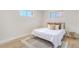 Bright bedroom featuring natural light, neutral tones, and modern décor at 1240 S Chase Ct, Lakewood, CO 80232