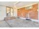 Covered patio leads to the kitchen and features ample space for outdoor enjoyment at 1240 S Chase Ct, Lakewood, CO 80232