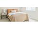Bedroom with warm lighting, plush bedding and matching nightstands at 5885 S Huron St, Littleton, CO 80120