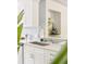 Close-up of the kitchen showcasing stainless steel appliances, countertops, and stylish decor at 5885 S Huron St, Littleton, CO 80120