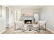 Finished basement with sleek fireplace, modern chairs, and stylish decor at 5885 S Huron St, Littleton, CO 80120