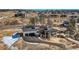 Aerial view of house and neighborhood at 5820 Powell Rd, Parker, CO 80134