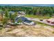 Elevated view highlighting the home's setting in a tranquil, tree-filled neighborhood at 5820 Powell Rd, Parker, CO 80134