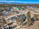 Expansive aerial view of the neighborhood highlighting the home's architectural design and landscaping at 5820 Powell Rd, Parker, CO 80134